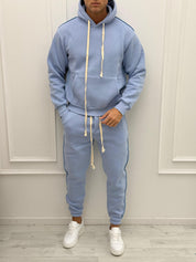 TUTA FELPATA RILIEVO - Colore bianco e rosa